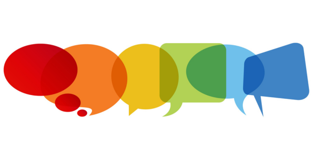 A variety of shapes and colors of talk bubbles arranged horizontally in a row.