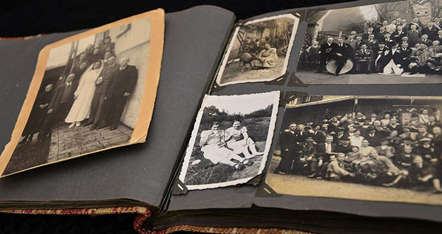 Old photographs in a scrapbook.