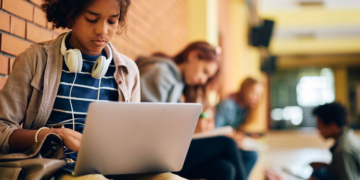 student working on a laptop computer.