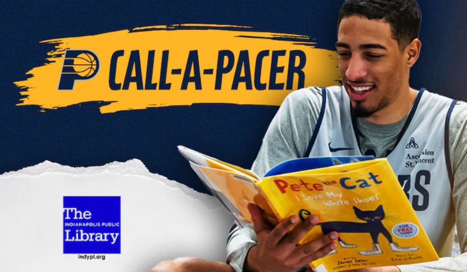 Tyrese Haliburton reading Pete the Cat: I Love My White Shoes