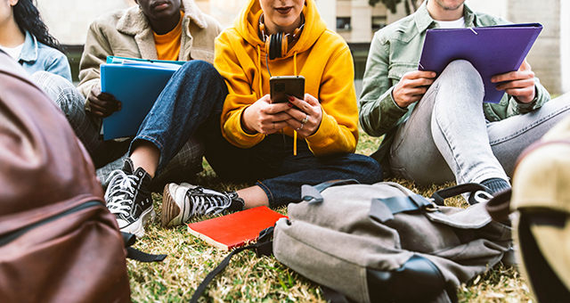 photo of teens reading on devices