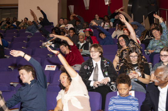 3 Bfit Yoga leading the crowd.