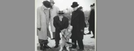 A child participates in the Arlington High School groundbreaking ceremony. This photograph is part of the new Indianapolis Public Schools Architecture Collection on digitalindy.org.